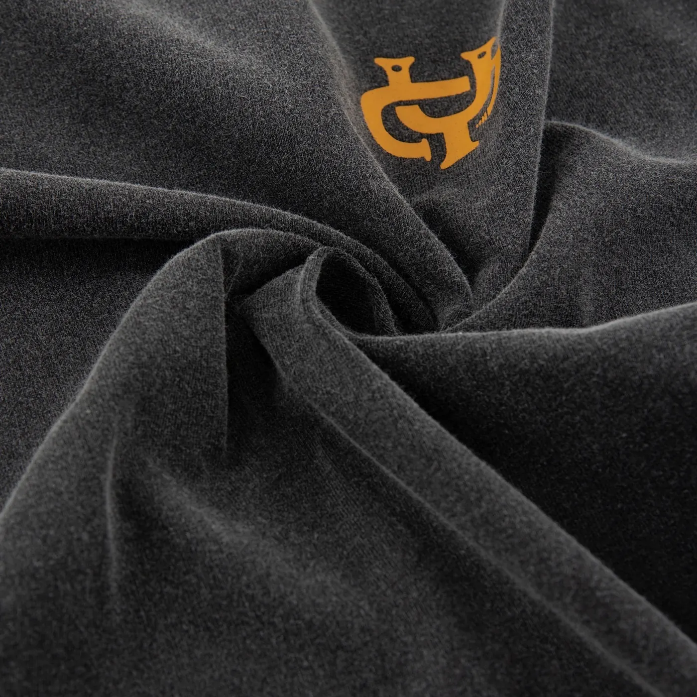 Close-up of heavy washed black cotton tee fabric