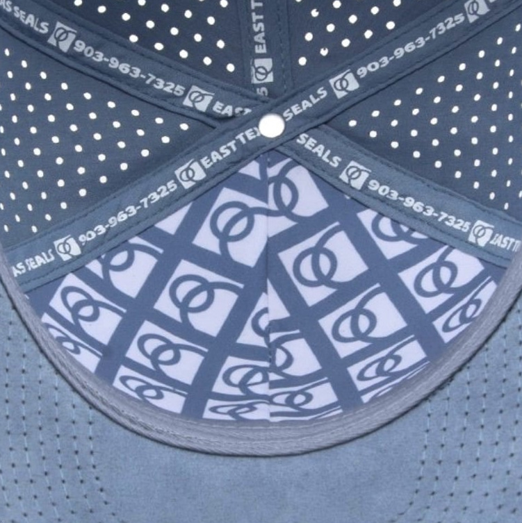 Printed interior fabric inside a blue cap