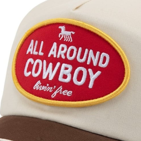 Embroidered patch on a cream cap