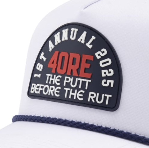 Rubber patch on a white cap with a navy rope